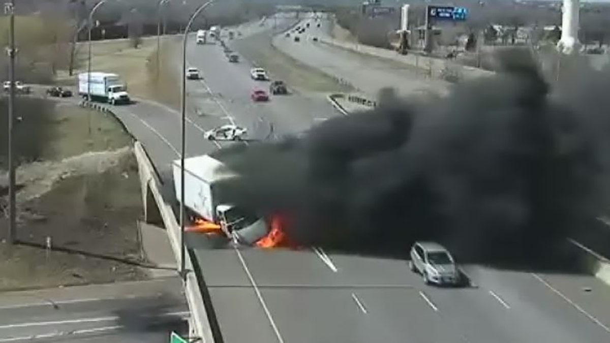 A box truck exploded along a highway in Minnesota on Monday after a car lost control and collided with the truck, authorities said.