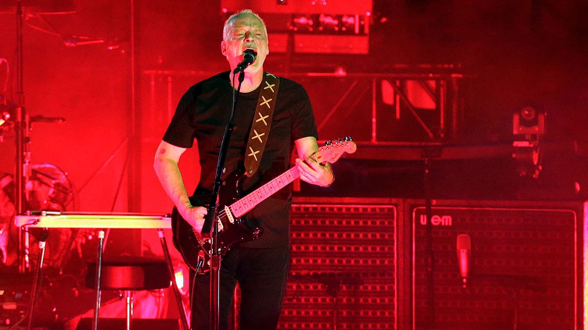 Gilmour playing guitar live