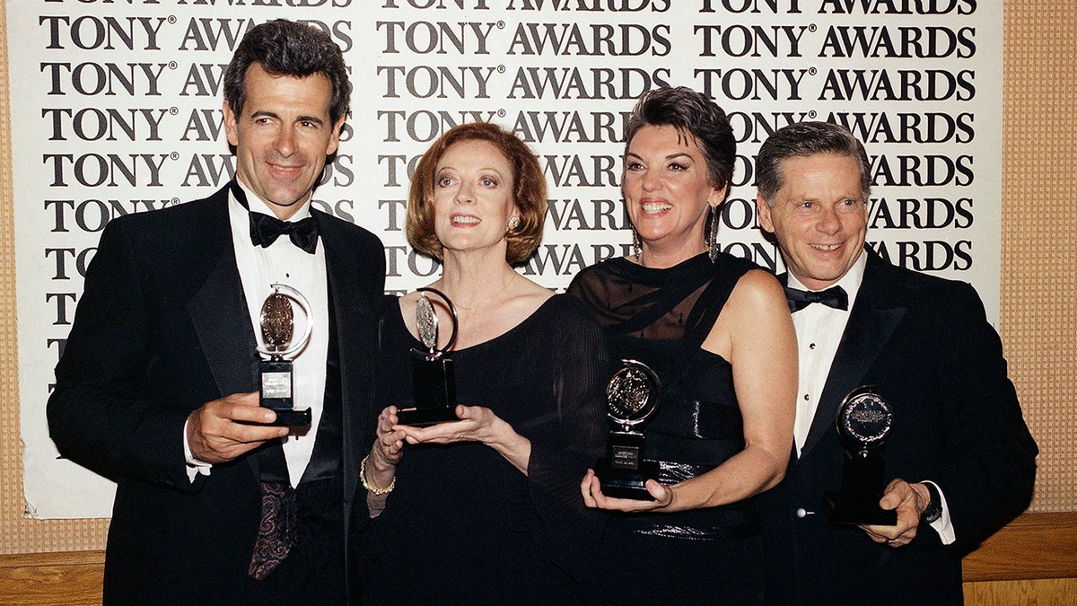 Tony Award winners, from left to right, James Naughton, best actor in "City of Angels," Maggie Smith, best actress for "Lettice and Lovage," Tyne Daly, best actress for "Gypsy," and Robert Morse, best actor for "Iru" pose with their trophies in New York on June 3, 1990. 