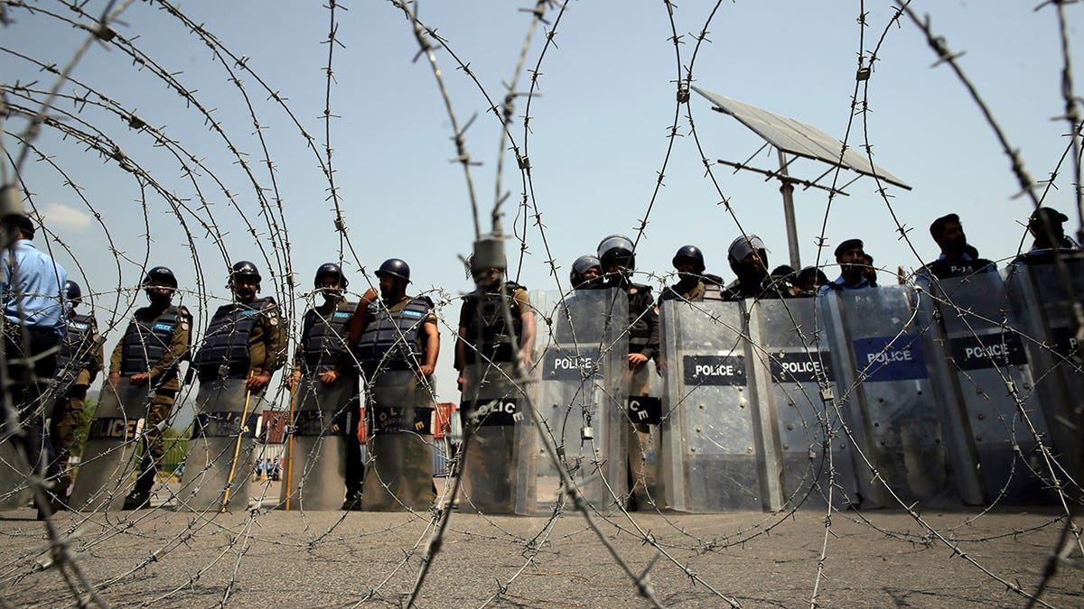 Guards at a protest in Pakistan