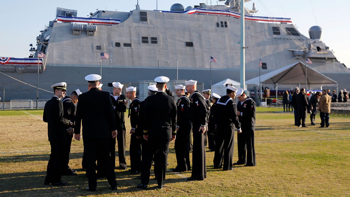 Navy sailors near ship