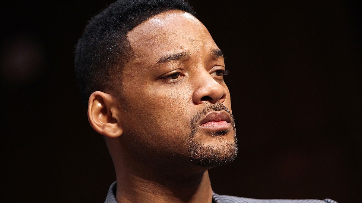 Actor Will Smith listens to testimony at the "The Next Ten Years In The Fight Against Human Trafficking: Attacking The Problem With The Right Tools" Committee Hearing at the Hart Senate Office Building on July 17, 2012 in Washington, D.C.