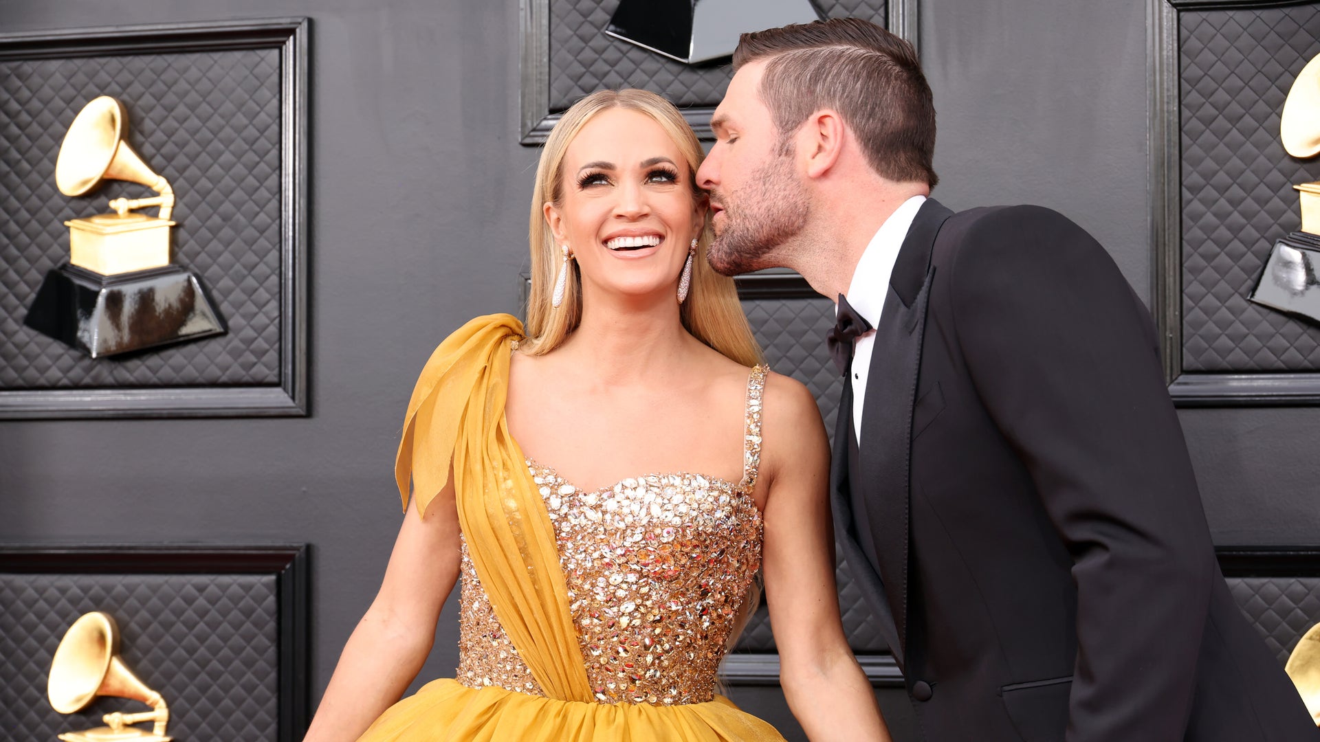 Carrie Underwood's Grammy Dress Out Reds the Carpet [Pictures]