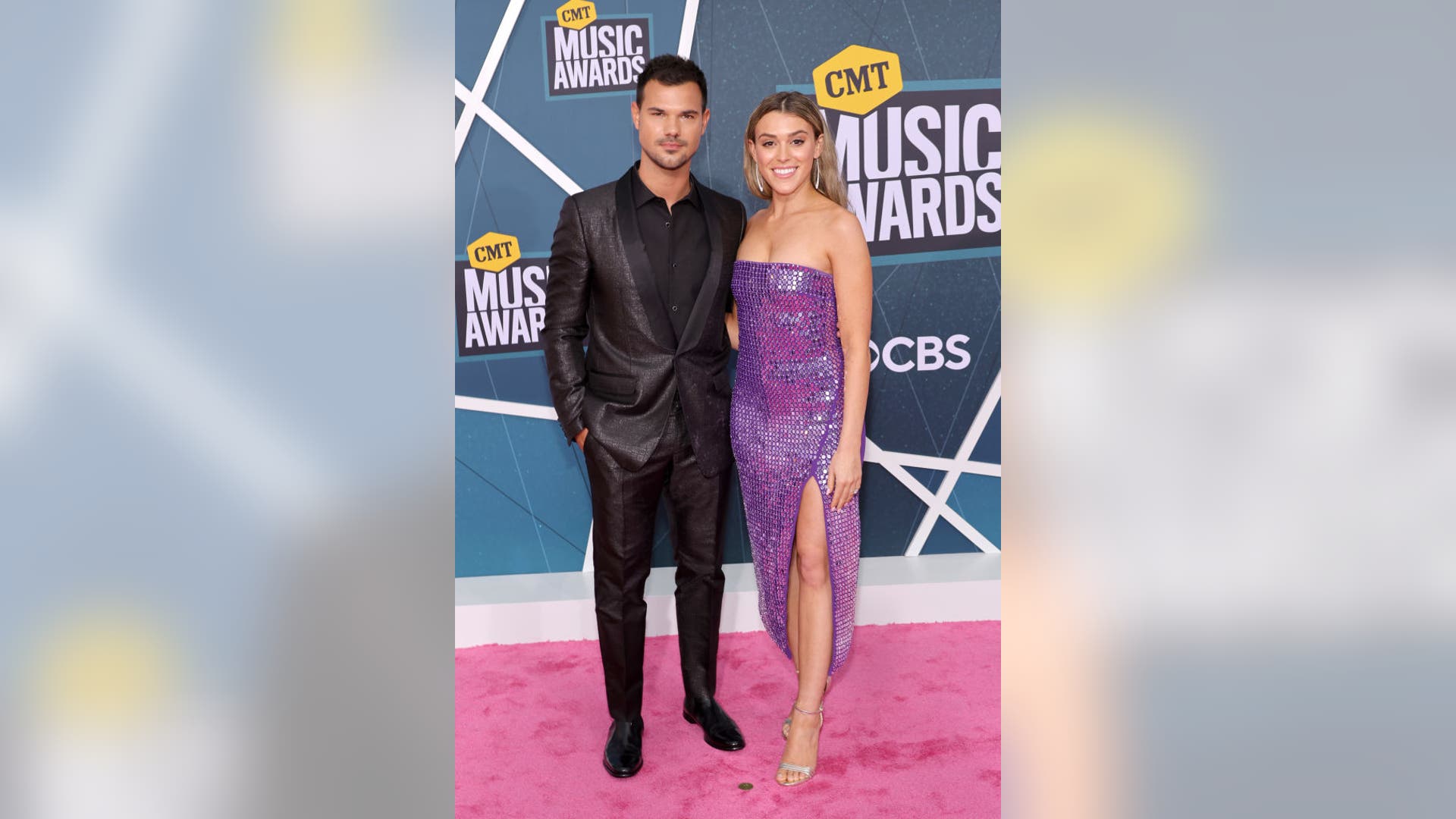 Taylor Lautner and Taylor Dome attend the 2022 CMT Music Awards.