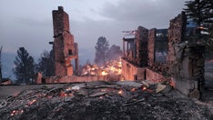 Crews fight New Mexico fires as some evacuations lift