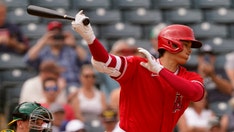 MLB, players keep automatic runners in extras for 2022