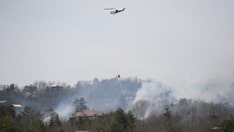 Dolly Parton calls for prayers as Tennessee fires threaten area near Dollywood