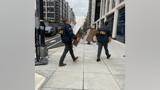 Two men posed as federal agents, provided Secret Service officers with iPhones, apartments, officials allege