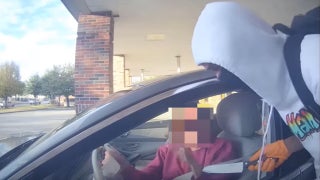 Woman robbed at knifepoint in broad daylight while using ATM