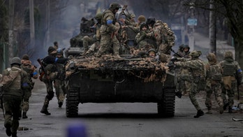 Ukrainian forces retake areas near Kyiv amid fear of traps