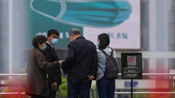 Shanghai erects metal barriers in fight against COVID-19