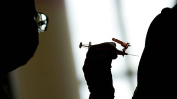 CDC advisory committee votes to add COVID-19 vaccine to immunization schedules for children, adults