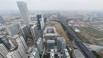 China home sales drop in July, exposing fragile market