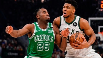 Giannis Antetokounmpo, Jrue Holiday help Bucks rally past Celtics
