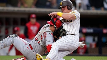 Padres' Luke Voit collides with Reds' Tyler Stephenson at plate, tensions boil