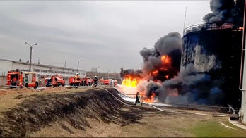 Ukraine reacts after Russia accuses its helicopters of launching airstrikes on oil depot across the border