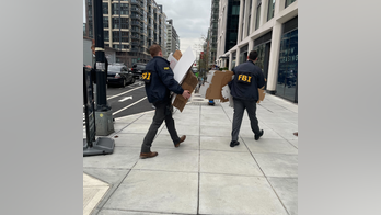 Two men posed as federal agents, provided Secret Service officers with iPhones, apartments, officials allege