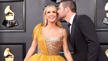 Grammys 2022: Stars hit red carpet ahead of music's biggest night