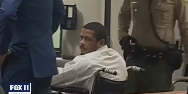 Aariel Maynor sits in a wheelchair in a Los Angeles County courtroom. He was sentenced to three life terms Tuesday for the killing of Jacqueline Avant during a home burglary on Dec. 1, 2021. 