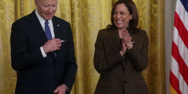 U.S. President Joe Biden and Vice President Kamala Harris listen as former U.S. President Barack Obama speaks about the Affordable Care Act and Medicaid at the White House in Washington, U.S., April 5, 2022.  REUTERS/Leah Millis