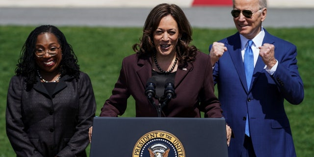 U.S. President Joe Biden pumps his fists as Vice President Kamala Harris delivers remarks on Judge Ketanji Brown Jackson’s confirmation as the first Black woman to serve on the U.S. Supreme Court, on the South Lawn at the White House in Washington