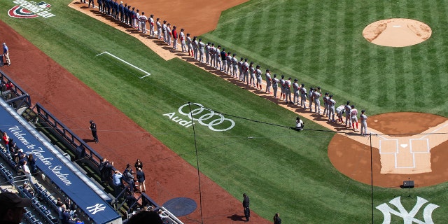 The Boston Red Sox stand on the third-base line during introductions before the start of the game against the New York Yankees at Yankee Stadium in the Bronx, on Apr 8, 2022. (Tom Horak-USA TODAY Sports)