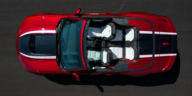 The festival cars are Camaro SS models finished in wild cherry tintcoat paint.