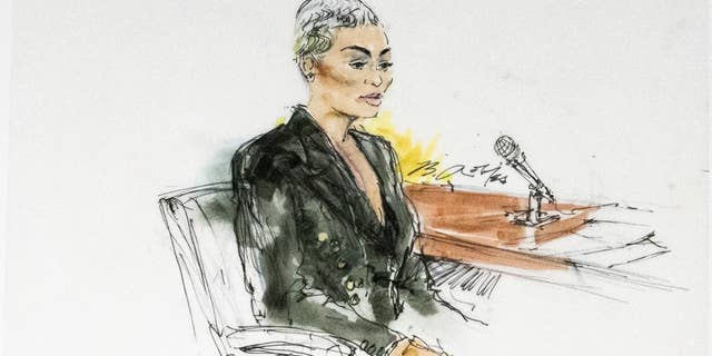 In this courtroom artist sketch, former reality television star Blac Chyna sits in court in Los Angeles, Tuesday, April 19, 2022.