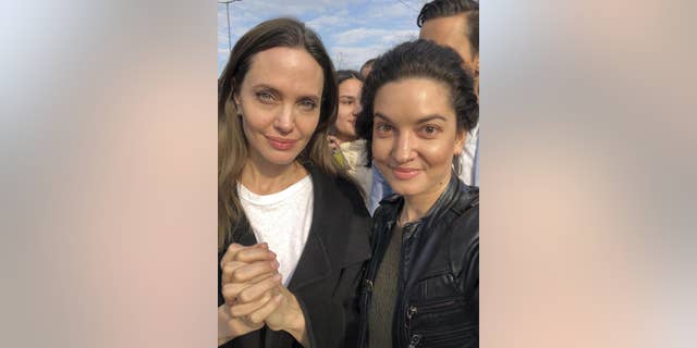 Hollywood movie star and UNHCR Goodwill Ambassador Angelina Jolie poses for a photo with her fans in Lviv, Ukraine, Saturday, April 30, 2022. 