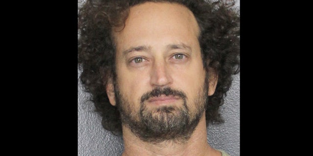 This photo provided by Broward County Sheriff’s Office shows Charles Adelson, a Florida dentist who was arrested on charges that he hired hit men eight years ago to kill his sister’s ex-husband, a prominent law professor.
