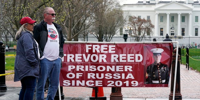 Joey and Paula Reed, parents of U.S. Marine Corps veteran and Russian prisoner Trevor Reed, stand in Lafayette Park near the White House on March 30, 2022, in Washington. 