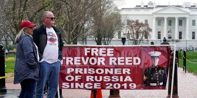 Joey and Paula Reed, parents of U.S. Marine Corps veteran and Russian prisoner Trevor Reed, stand in Lafayette Park near the White House on March 30, 2022, in Washington. 