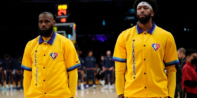 Los Angeles Lakers forward LeBron James, left, and forward Anthony Davis stand together before a game against the New Orleans Pelicans in Los Angeles April 1, 2022.
