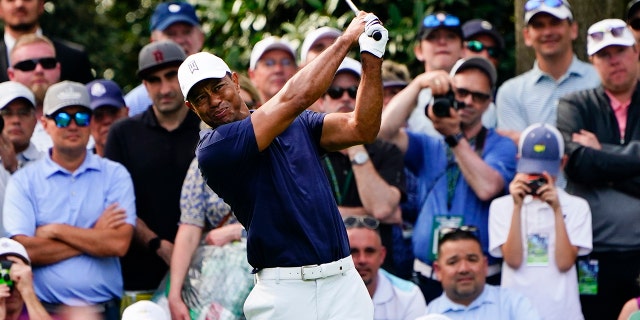 Tiger Woods tees off on the seventh hole during a practice round for the Masters golf tournament on Monday, April 4, 2022, in Augusta, Ga.