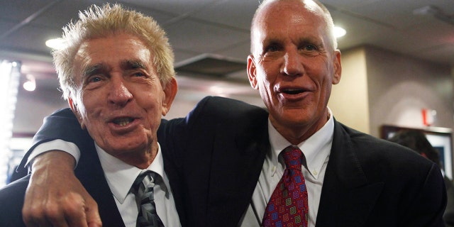Former Philadelphia 76ers coach Gene Shue, left, and his former player and 76ers coach Doug Collins are seen at a news conference in Philadelphia, Monday, May 24, 2010.