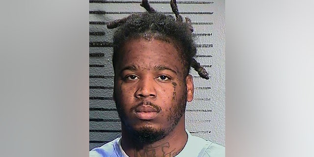 This Feb. 6, 2022, booking photo provided by the California Department of Corrections and Rehabilitation shows Smiley Allen Martin, two days before he was released to Sacramento County probation for his sentence on charges of corporal injury and assault likely to cause great bodily injury. Martin was arrested Tuesday, April 5, 2022, in connection with a mass shooting that killed six people in Sacramento, Calif. Martin is the brother of Dandrae Martin, the first suspect taken into custody in the investigation.