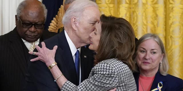 Democrats James Clyburn of South Carolina, Biden, Pelosi, Susan Wild of Pennsylvania (AP/Carolyn Kaster)