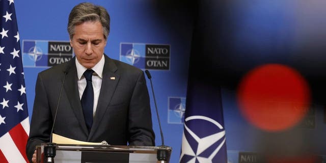 U.S. Secretary of State Antony J. Blinken prepares to address a media conference after a meeting of NATO foreign ministers at NATO headquarters in Brussels, Thursday, April 7, 2022. Ukraine on Thursday appealed to NATO for more weapons in its fight against Russia to help prevent further atrocities like those reported in the city of Bucha, and urged Germany to slash red tape so that more supplies can get in. (AP Photo/Olivier Matthys)