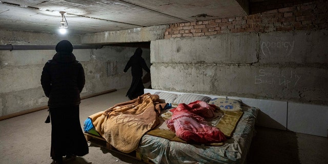 Nuns preparing to take shelter from air raids at the Hoshiv Women Monastery in Ukraine's Ivano-Frankivsk region April 6.