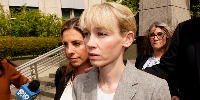 Sherri Papini of Redding leaves the federal courthouse after her arraignment in Sacramento, California, Wednesday, April 13, 2022. 