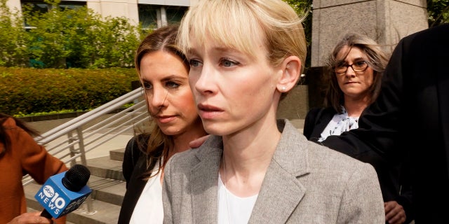 Sherri Papini of Redding leaves the federal courthouse after her arraignment in Sacramento, California, Wednesday, April 13, 2022.