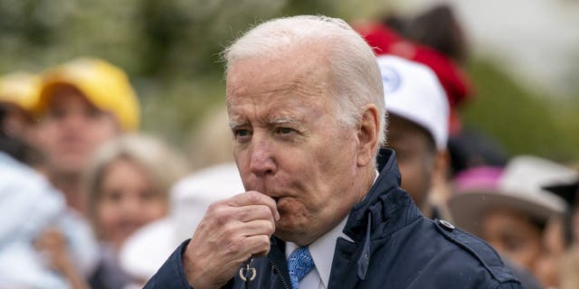 President Joe Biden blows his whistle for the start of a race during the White House Easter Egg Roll, Monday, April 18, 2022, in Washington.