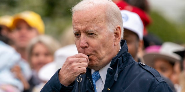 President Joe Biden blows his whistle before the start of a race during the White House Easter Egg Roll, Monday, April 18, 2022. (AP Photo/Andrew Harnik)