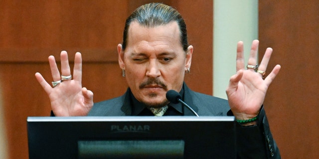 US actor Johnny Depp testifies during his defamation trial in the Fairfax County Circuit Courthouse in Fairfax, Virginia, on April 19, 2022.