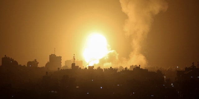 An explosion is caused by Israeli airstrikes on a Hamas military base in town of Khan Younis, southern Gaza Strip, April 19, 2022.