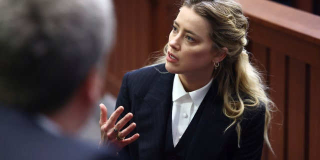 Actor Amber Heard appears in the courtroom at the Fairfax County Circuit Court in Fairfax, Va., Thursday, April 21, 2022.