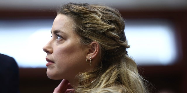 Actor Amber Heard appears in the courtroom at the Fairfax County Circuit Court in Fairfax, Va., Thursday, April 21, 2022. 