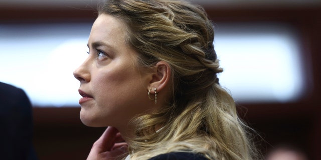 Actor Amber Heard appears in the courtroom at the Fairfax County Circuit Court in Fairfax, Va., Thursday, April 21, 2022.