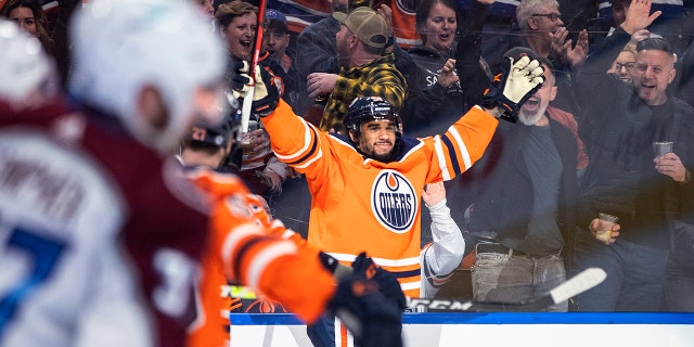 Edmonton Oilers' Evander Kane (91) celebrates a goal against the Colorado Avalanche during the second period of an NHL hockey game in Edmonton, Alberta, Friday, April 22, 2022.