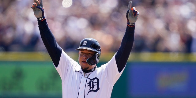 Detroit Tigers designated hitter Miguel Cabrera reacts on first base after his 3,000th career hit during the first inning of the first baseball game of a doubleheader against the Colorado Rockies, Saturday, April 23, 2022, in Detroit. 